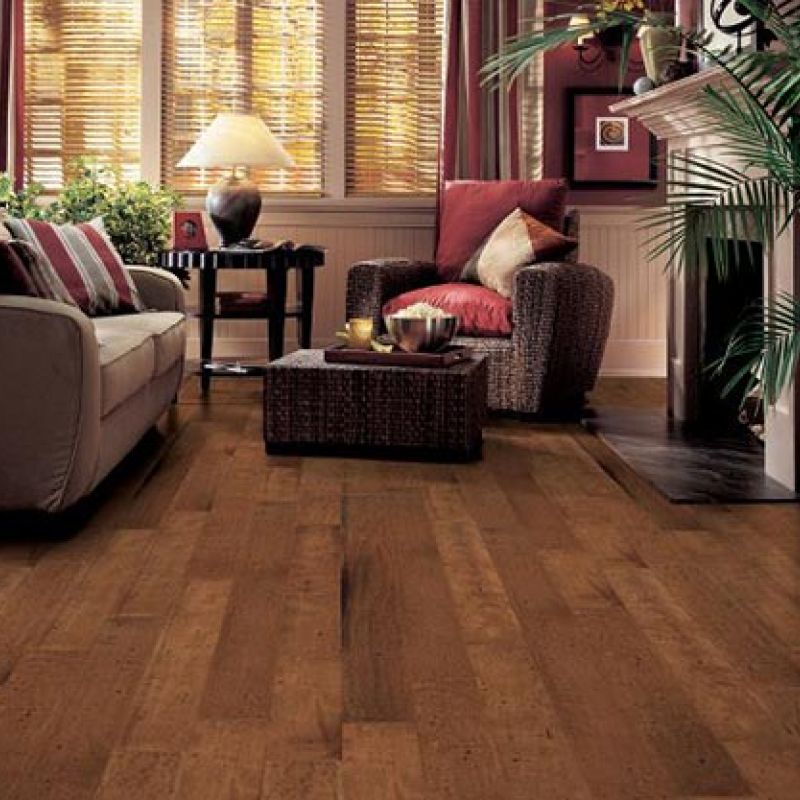 Classic looking brown satin hardwood floor in living rooom
