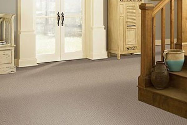 Residential entry with berber style carpet